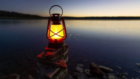 Lantern on the lake shore – Live Windows Background